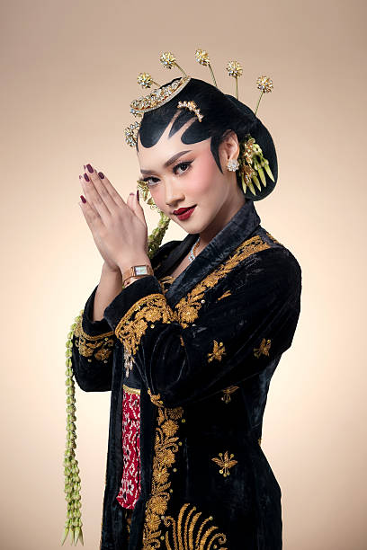 istock Graceful Javanese Bride in Traditional Greeting Pose 2247575768