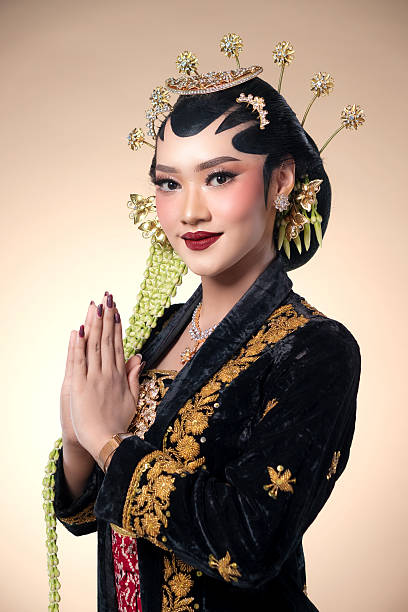 istock Graceful Javanese Bride with Traditional Greeting Pose 2247575774