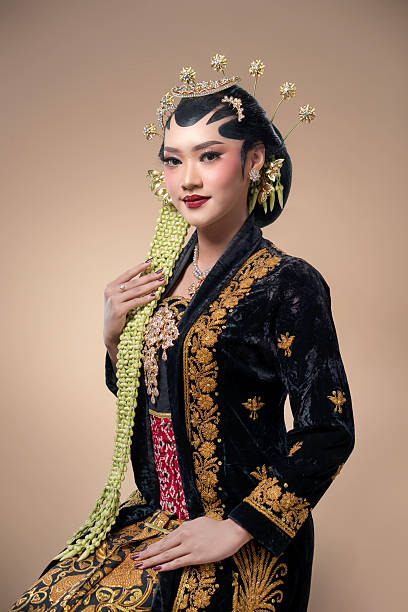 istock Elegant Indonesian Bride in Traditional Javanese Kebaya 2247575793