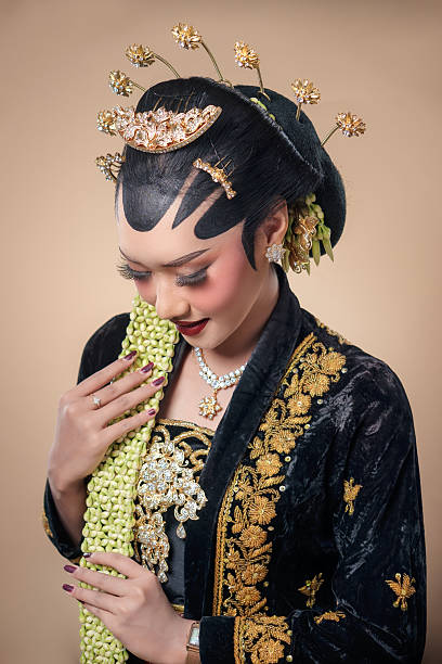 istock Graceful Javanese Bride in Traditional Indonesian Attire 2247575807