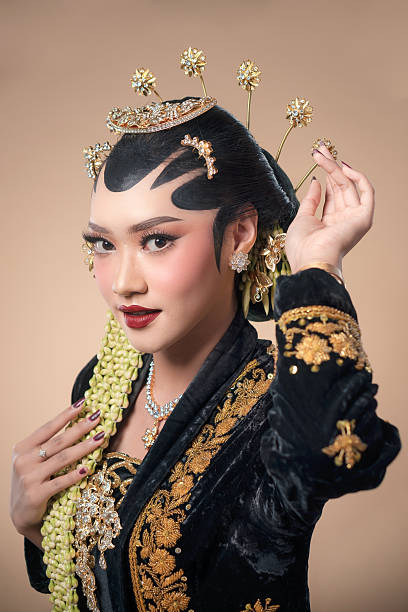 istock Elegant Javanese Bride with Ornate Traditional Accessories 2247575845