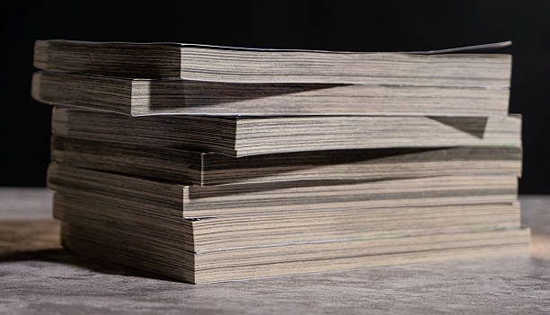 istock Close side angle of layered paperback books with visible page edges, creating a strong linear pattern and emphasizing learning, literature, and printed knowledge. 2247578189