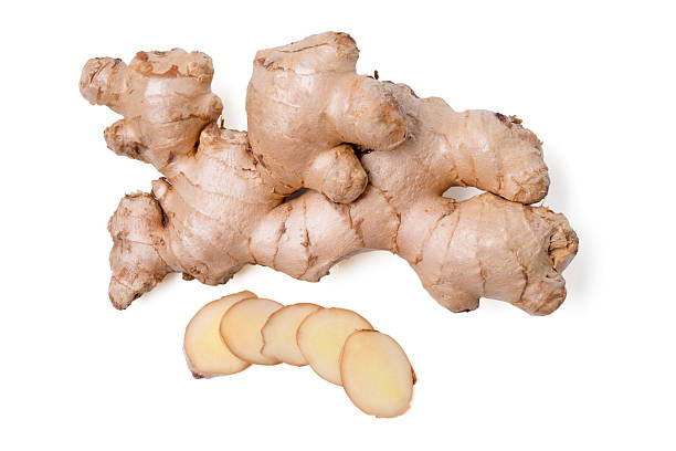 istock Fresh ginger root rhizome with shredded ginger on white background, 2247582146