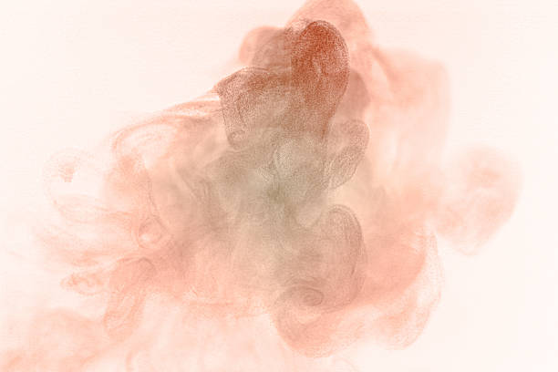 Soft peach and pink smoke swirling on a bright light background creates an elegant abstract texture perfect for modern design, artistic overlays, beauty themes, and creative visual projects needing.