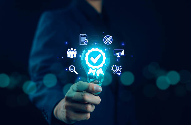 istock Businessman holding quality certification mark, audit, business, assurance, control, digital, service, complete, assessment, checklist, data with quality icon. 2247586597