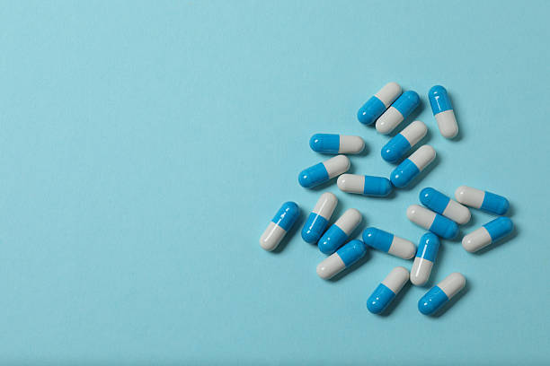 istock Pills in blister packs on a blue background 2247588690