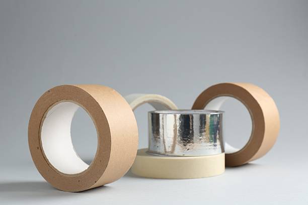 istock Rolls of different adhesive tapes on grey background 2247588883