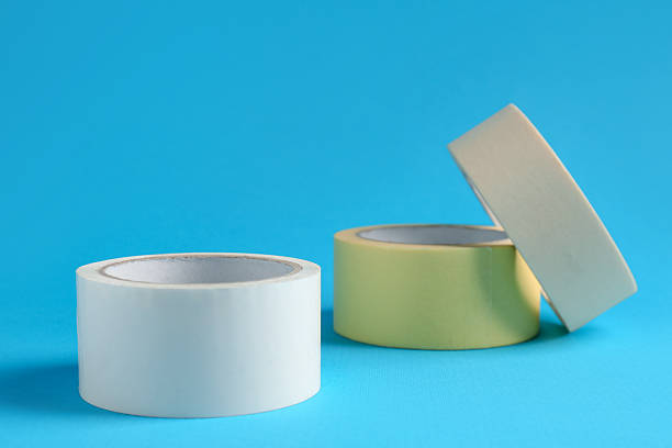 istock Rolls of different adhesive tapes on light blue background 2247588926