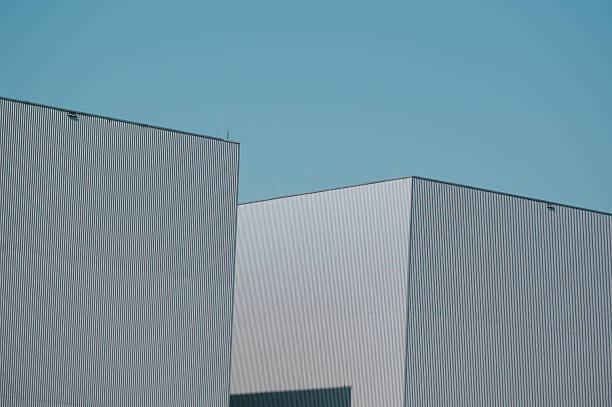istock abstract, monotonous view of a modern warehouse 2247590283