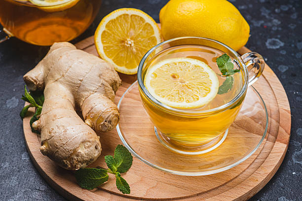 istock Tea with lemon and ginger in a mug 2247591533