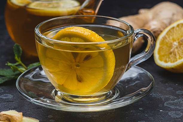 istock Tea with lemon and ginger in a mug 2247591841