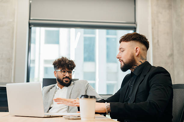 istock Diverse business professionals discussing project during office meeting 2247592851