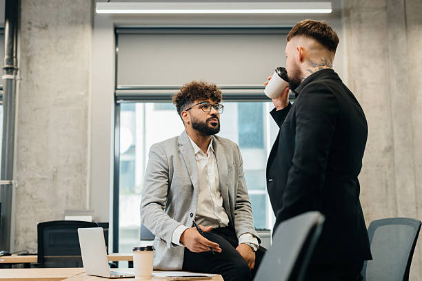 istock Diverse businessmen discussing startup ideas in office 2247592962