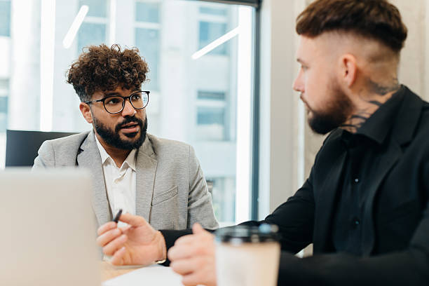 istock Business professionals discussing project during office meeting 2247593751