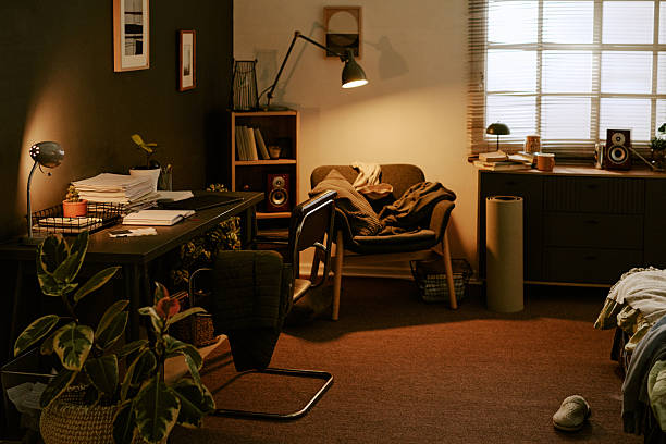 istock Cozy Room Interior with Cluttered Home Office Desk 2247596357