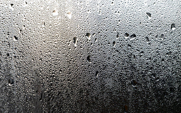 istock Natural water drops on glass, winter condensation. 2247597694