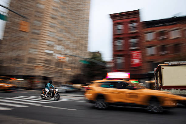 Traffic in New York with typical yellow taxis, Manhattan.