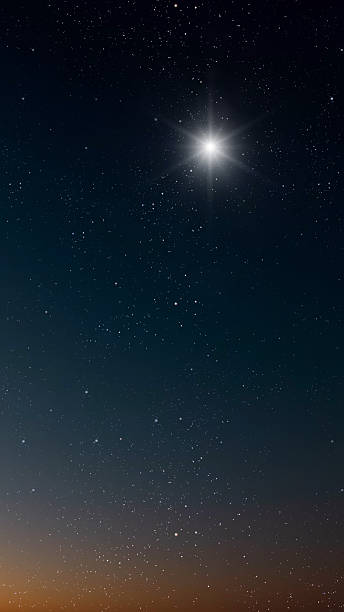 istock night Christmas panorama with a star in the sky 2247605862