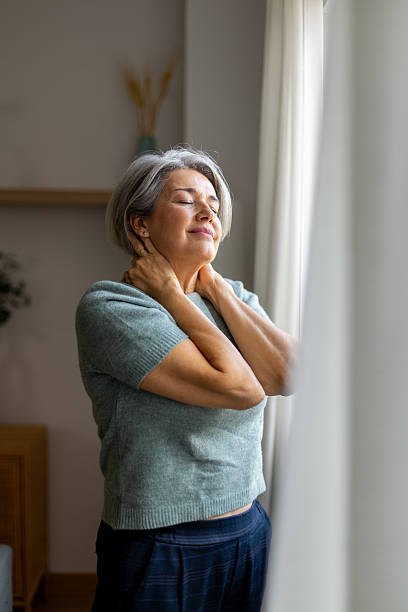 istock Mature woman finding peace and relax at home 2247611494