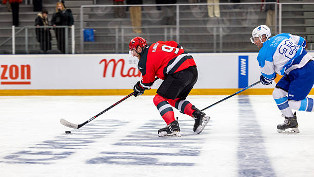 istock Professional Ice Hockey Player in Fast Break with Determination 2247616023