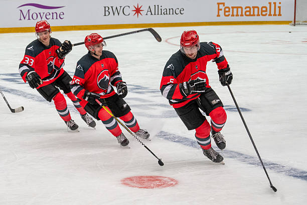 Hockey Players Sliding on Ice During Pre Game Warm up