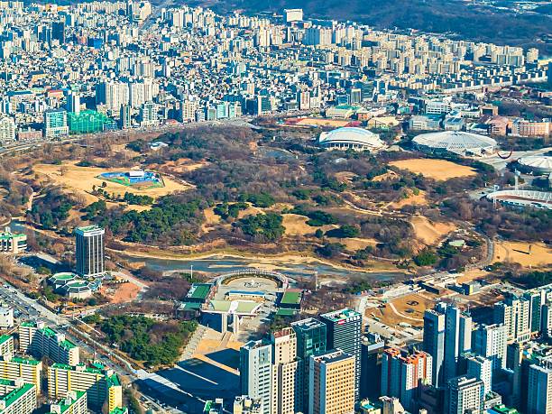 istock Panoramic aerial view of a sprawling city park surrounded by urban development 2247616825