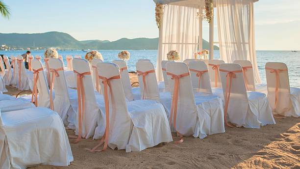 istock Beach wedding ceremony setup with chairs and drapes 2247616998