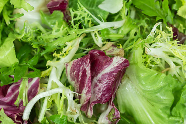 istock green salad, mixed fresh salad leaves background 2247617108