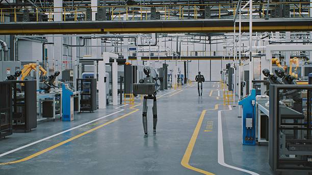 istock Automated Logistics Robots Transporting Cargo Cases in Production Plant 2247619386