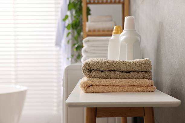 istock Soft towels and detergents on bench indoors. Space for text 2247621495