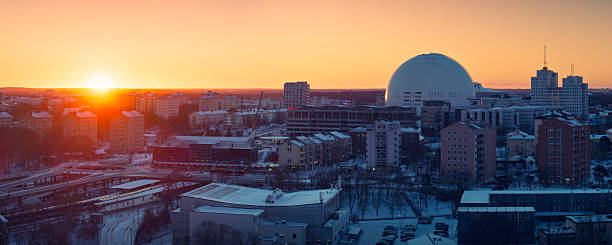Panoramic view of the Johanneshov district of Stockholm and Gullmarsplan station on a winter morning at sunrise. In the background on the right is Avicii Arena.