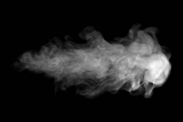 istock Dense white smoke drifting horizontally on a black background, forming soft abstract clouds and textured motion ideal for creative design overlays, visual effects, and modern artistic projects. 2247622446