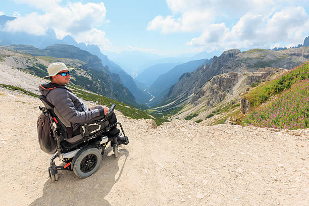 istock Wheelchair user enjoys Dolomites views 2247623126