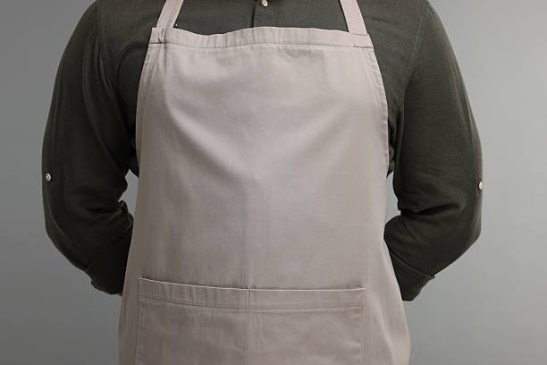 istock Man in kitchen apron on grey background, closeup. Mockup for design 2247625061