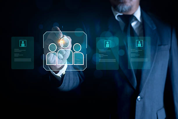 istock Businessman select target candidates, resume documents, and profile symbol. Concept of recruitment, job search, HR analytics, and candidate selection. 2247627322