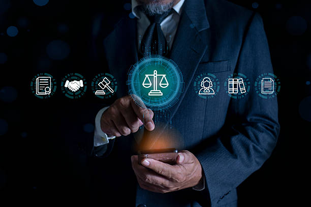 istock Businessman using smartphone with digital legal technology interface with justice scale. online legal services, digital justice, symbolizing law innovation. 2247627326