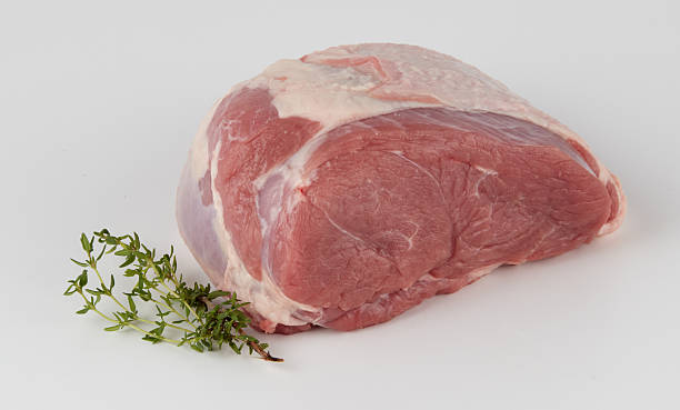 istock Fresh pork slices Thyme leaves isolated nature background with clipping path 2247627573