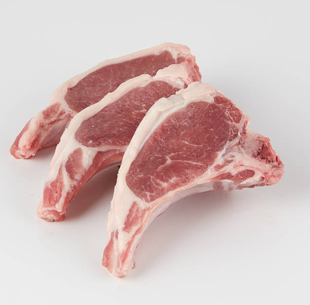 istock Fresh pork bones slices isolated nature background with clipping path 2247627588