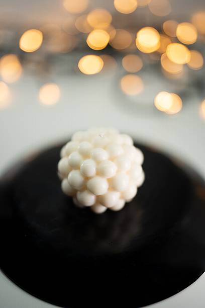 Beautiful white creative decoration ideas for Christmas celebration. Elegant candle