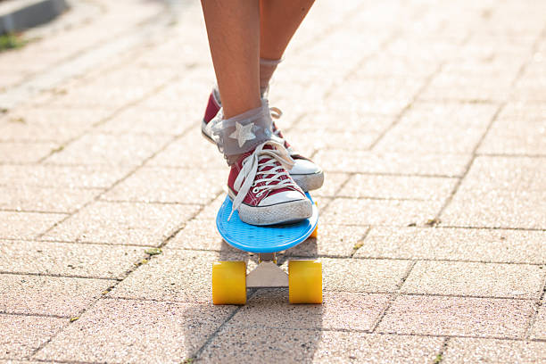 istock Dynamic Skateboarding Moment in Urban Park 2247630694
