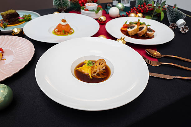 istock Elegant culinary presentation of multiple dishes on white plates 2247631168