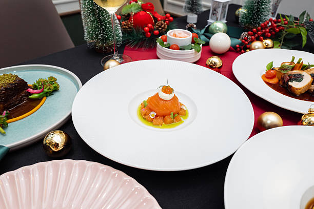 istock Festive Holiday Dinner Table with Gourmet Cuisine and Decorations 2247631170