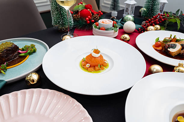 istock Festive Holiday Dinner Table with Gourmet Cuisine and Decorations 2247631173