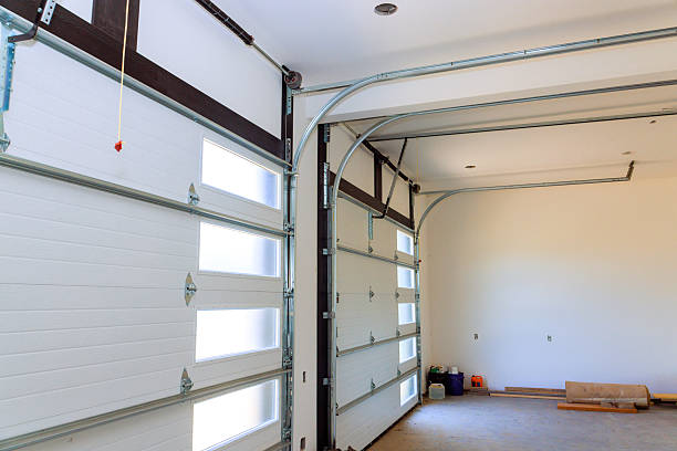 istock Spacious garage interior with modern design abundant natural light for vehicle storage workspace 2247633246