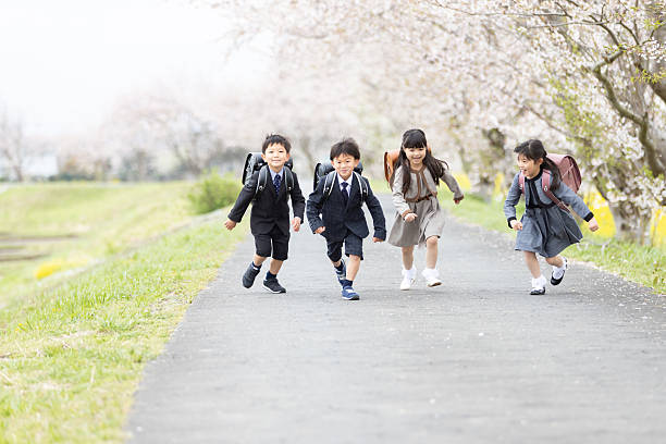 Asian boys and girls entering elementary school