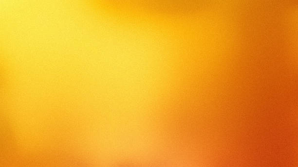istock Noisy gradient orange yellow grainy blurred warm abstract thanksgiving background with copy space 2247637353