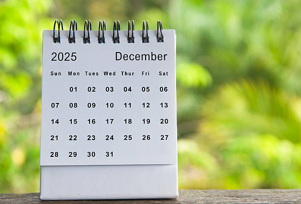 istock December calendar with blurred nature background. Copy space and new month concept 2247638541