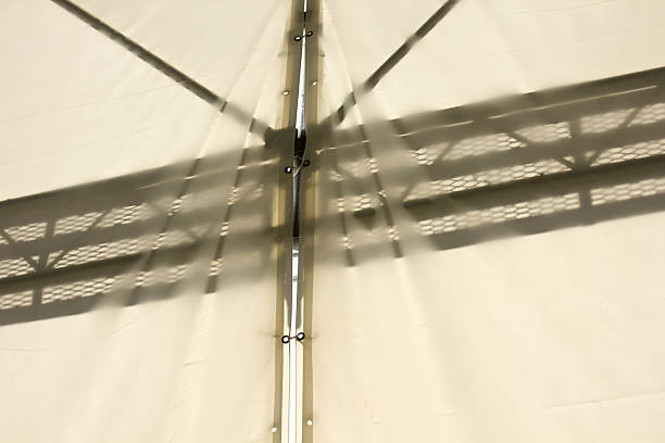 istock Silhouette of scaffolding visible through the tent 2247639373