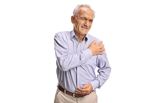 istock Elderly man in pain holding his shoulder 2247639407
