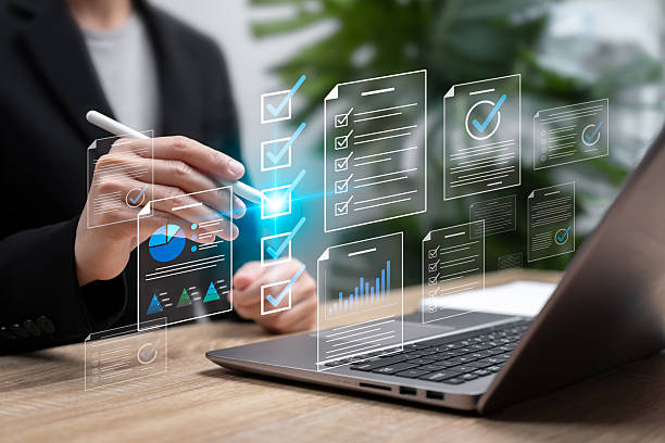 istock Business Performance Checklist document Concept, Businesswoman Checking Online Documents, Verifying Accuracy, Planning Business Strategies, Ensuring Product Quality Assurance, Building Customer Trust 2247639921